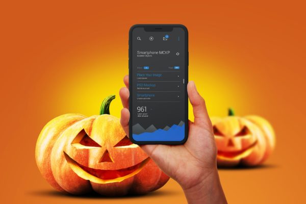 南瓜头元素万圣节场景手持智能手机样机 Halloween Mockup Hands Holdind Smartphone