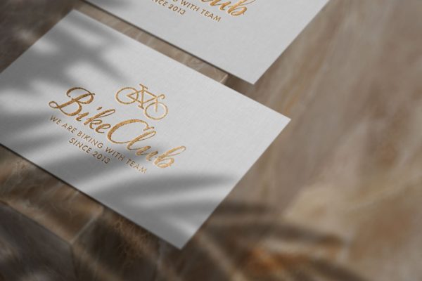 亚麻纸浮雕效果金色Logo样机 Embossed gold logo mockup on linen paper