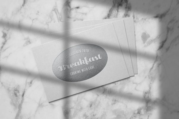 亚麻纸浮雕效果银色Logo样机 Embossed silver logo mockup on linen paper