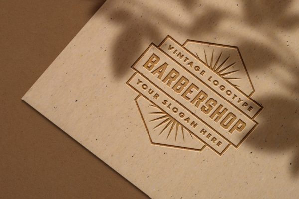 工艺纸浮雕工艺Logo设计样机 Embossed logo mockup on craft paper