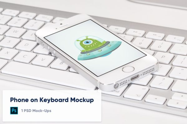 电脑键盘经典iPhone手机样机模板 Phone on the computer keyboard
