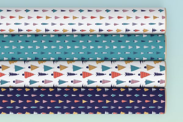 四个卷曲礼品包装纸图案设计样机 Four Tube Gift Wrapping Paper Mockup